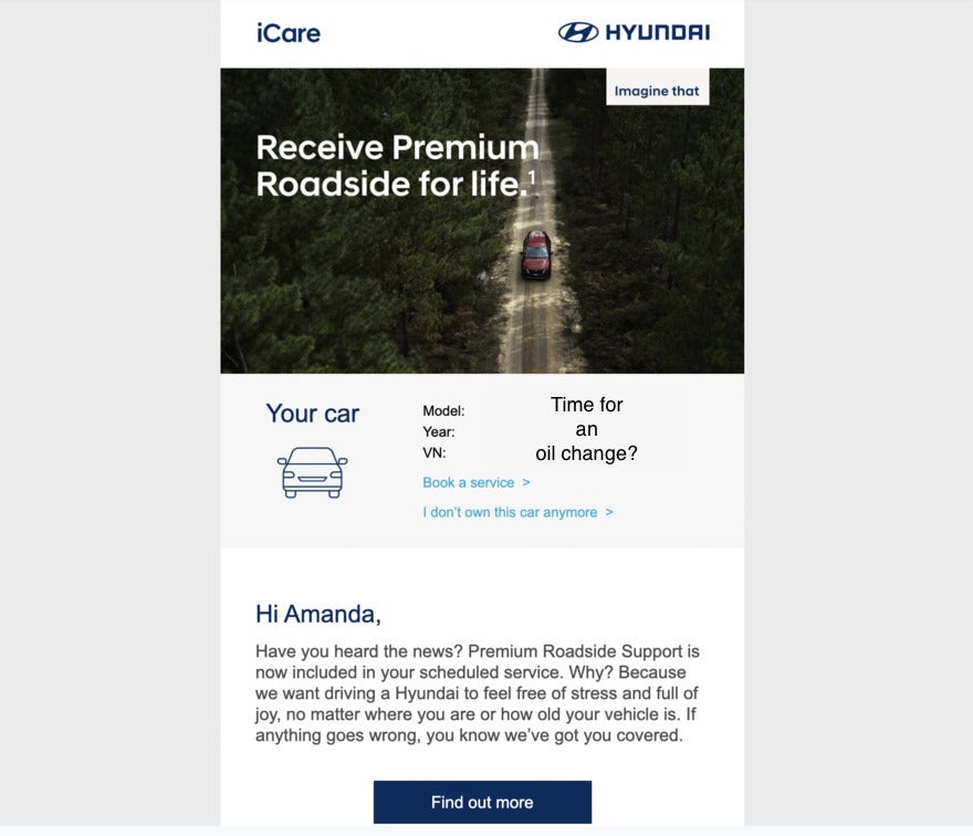 Email from Hyundai suggesting a car service. There's a photo of a car driving a car on a forest road.