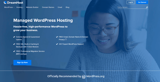 dreamhost managed wordpress page with blue overlain picture of woman smiling looking down at laptop screen