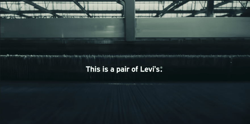 Still from Levi's video showing the manufacturing of jeans captioned "This is a pair of Levi's"