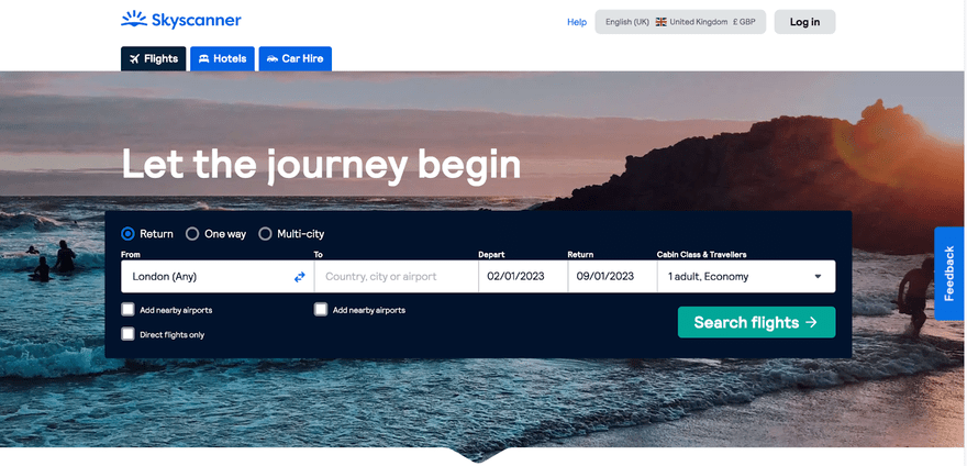 Skyscanner homepage featuring a search feature against a background of a beach scene